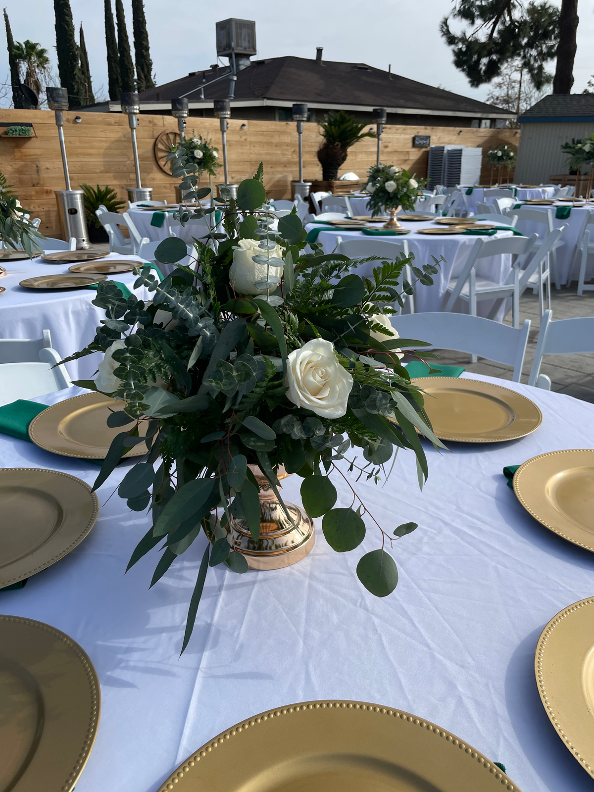 White and Greenery Centerpieces by Bianca's Flowers