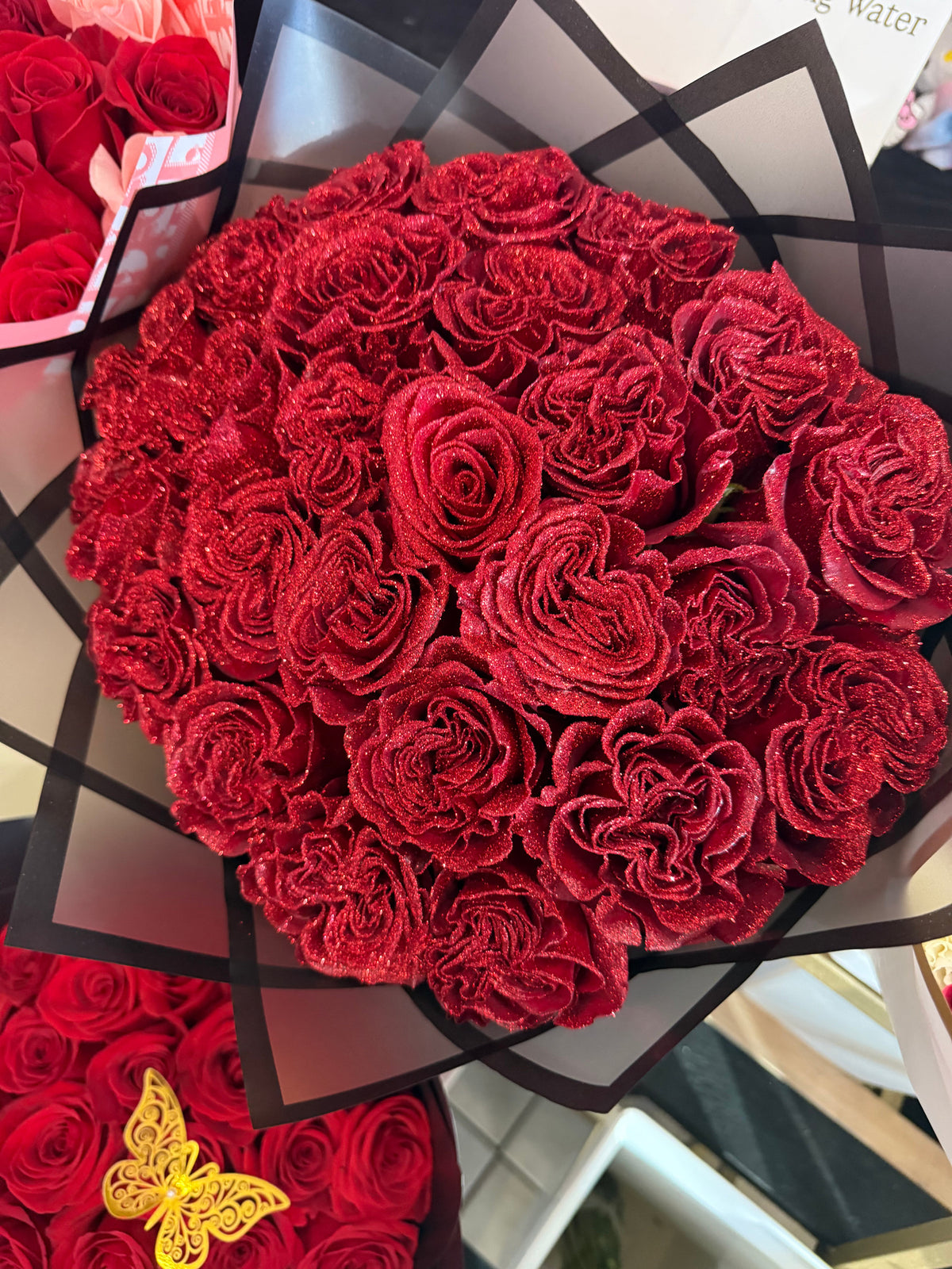 Red Glitter Roses by Bianca's Flowers