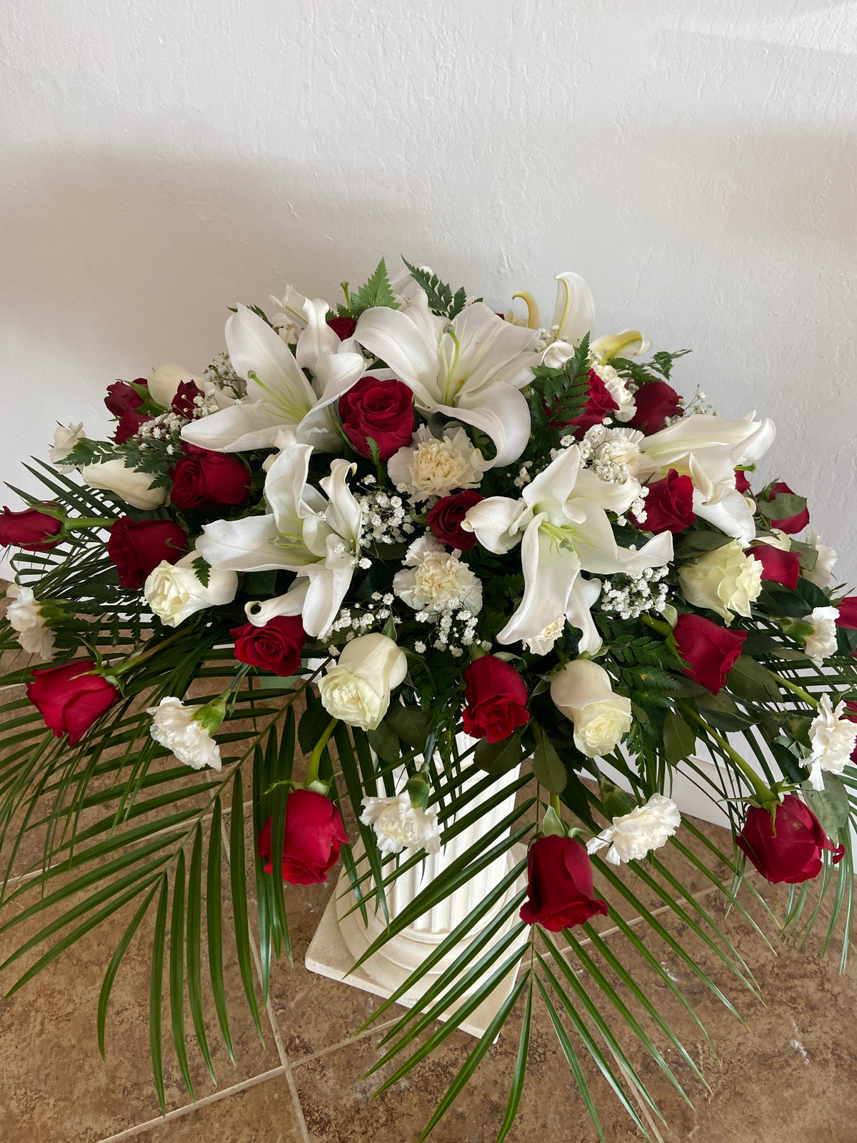 White and Red Casket Spray by Bianca's Flowers