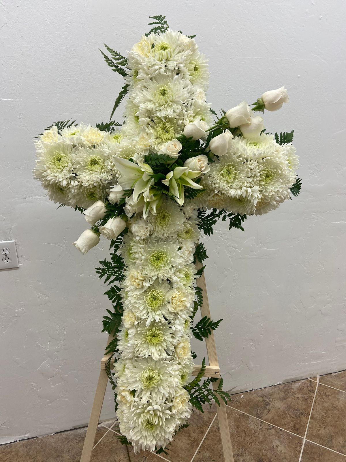 White Cross and Greenery by Bianca's Flowers
