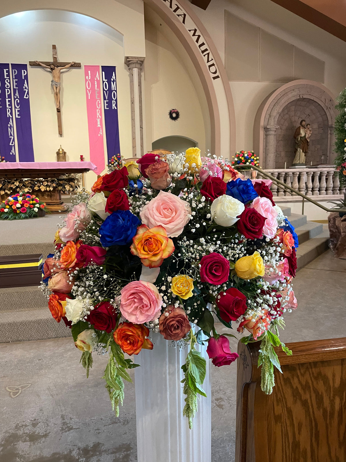 Different Colored Centerpieces by Bianca's Flowers